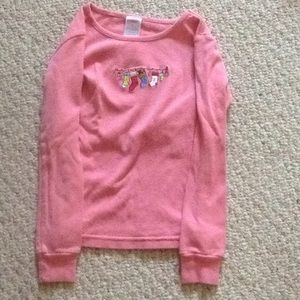 Pink Christmas pajama shirt.